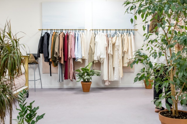A rack of clothes that can help you declutter and organize your closet.