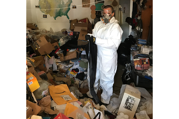 A Clear Path worker gearing up to clear a hoarding situation in West LA 