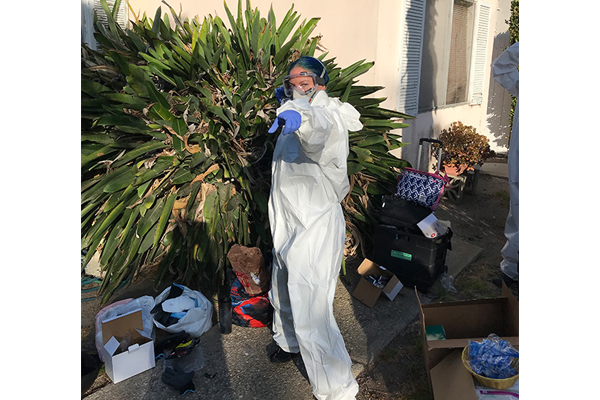 A Clear Path worker gearing up to clear a hoarding situation in West LA 